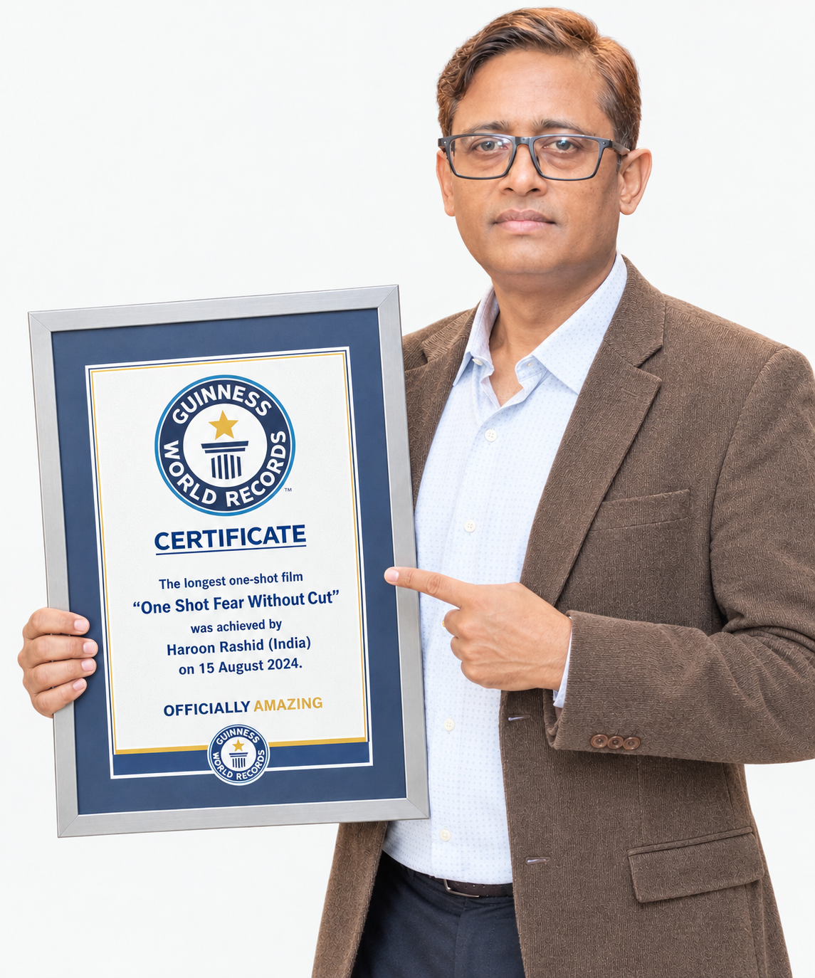 Haroon Rashid holding his Guinness World Records certificate for One Shot: Fear Without Cut