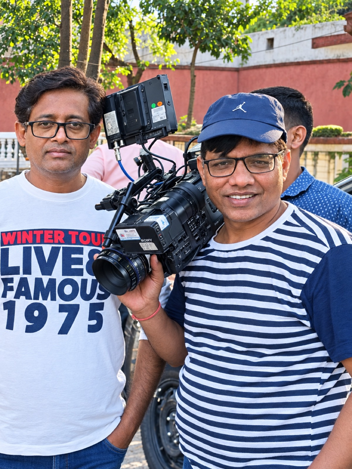 Haroon Rashid on set with a cinema camera